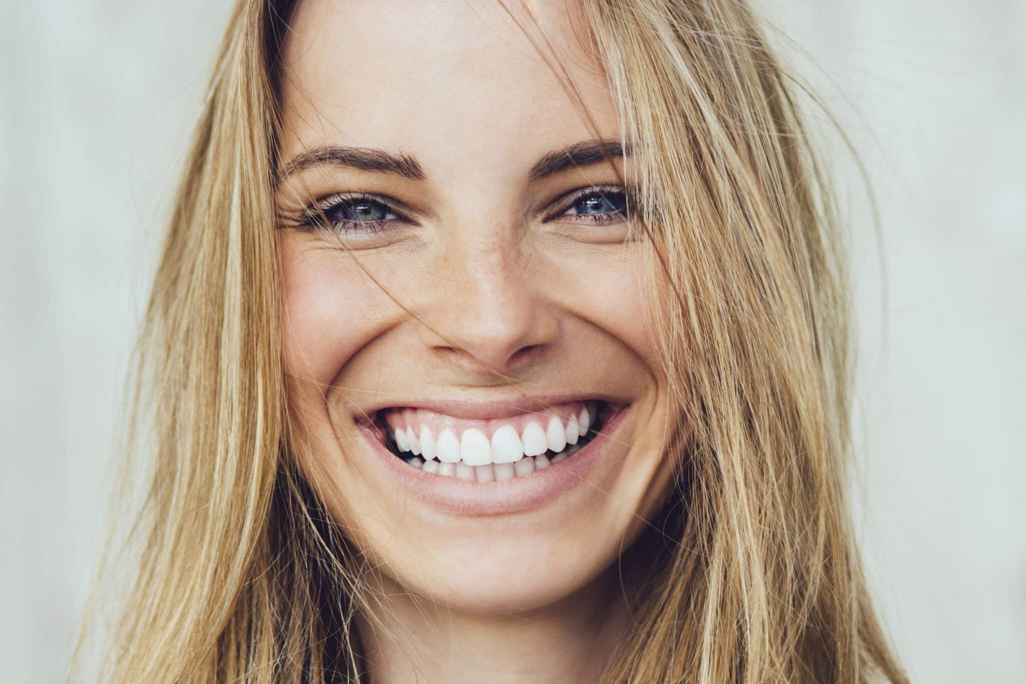 Portrait of young woman with beautiful smile