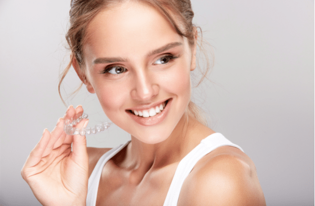 Young woman at dentists Invisalign orthodontics